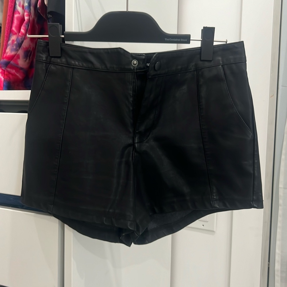 Black short faux leather shorts